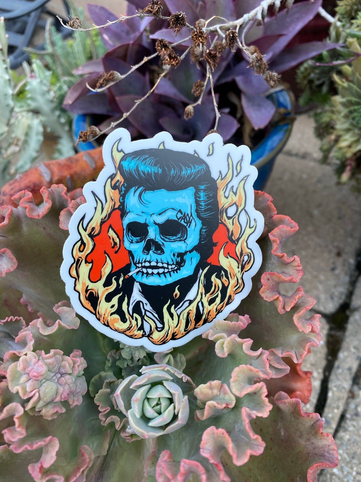 The man in black skull sticker with cigarette- ring of fire cash the man in black