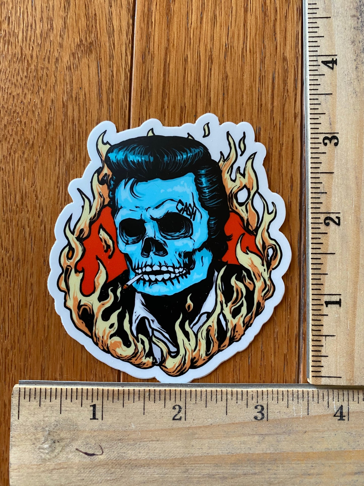 The man in black skull sticker with cigarette- ring of fire cash the man in black