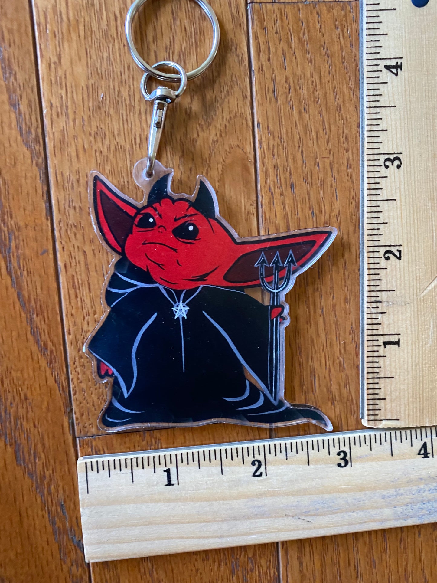 The evil child - super cute keychain- created by artist Penny slice