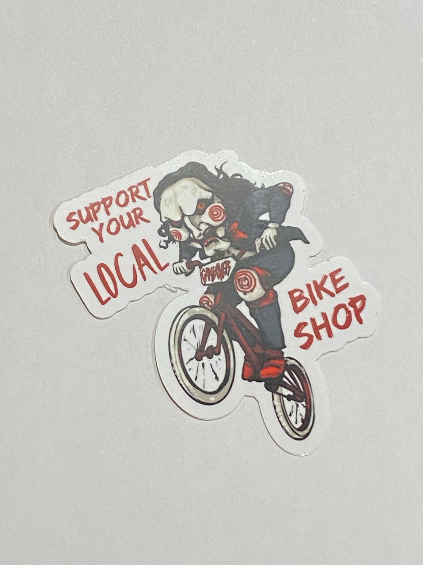 support you local bike shop saw