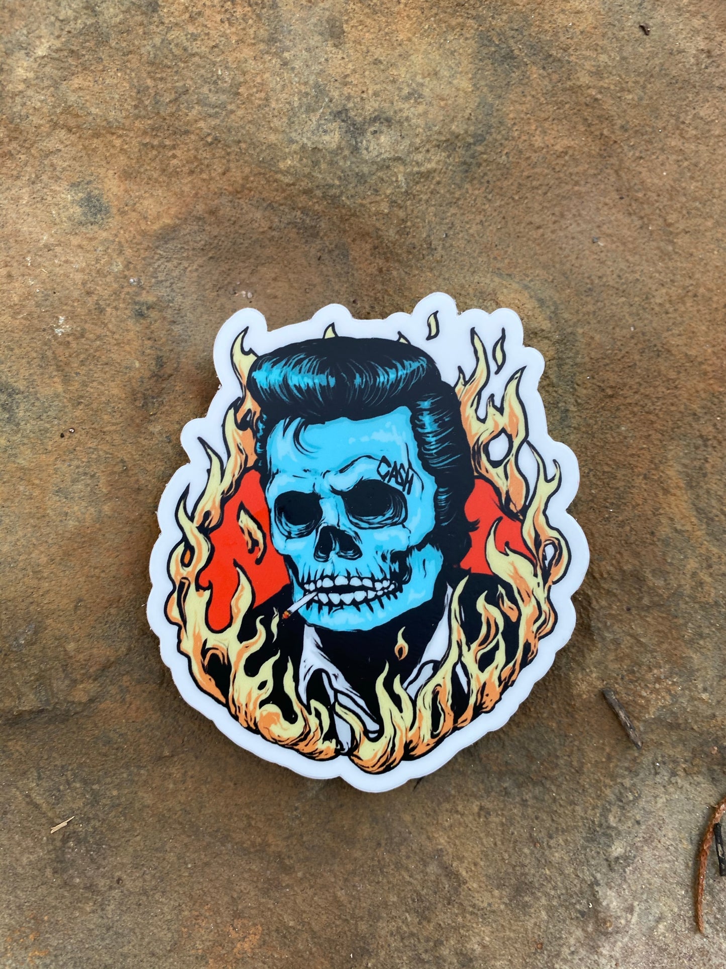 The man in black skull sticker with cigarette- ring of fire cash the man in black